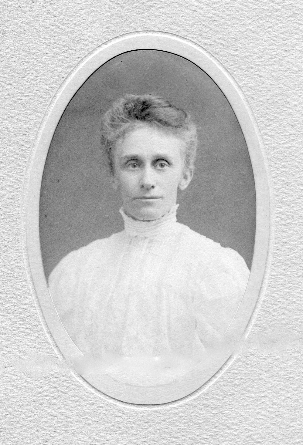 Oval-framed photo portrait of Alice Jones