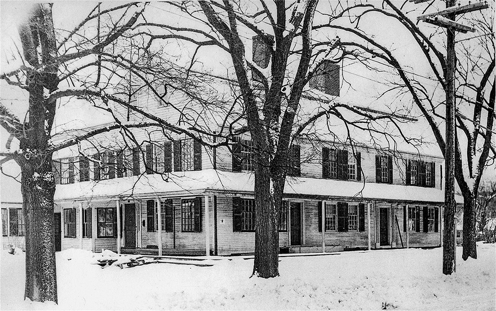1952 photograph of the Josiah Smith Tavern in winter