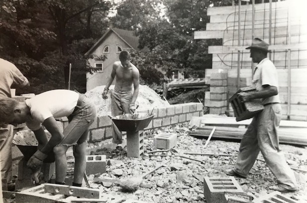 Students help with building construction