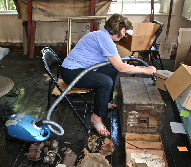 Mary Marder vacuuming